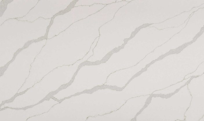 White marble surface with gray, veined lines running diagonally across the image.