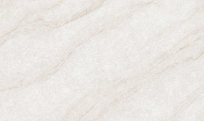White marble surface with subtle gray and beige veining running diagonally across the stone.