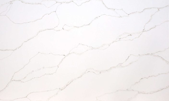 White marble surface with subtle gray veining running diagonally across the image.